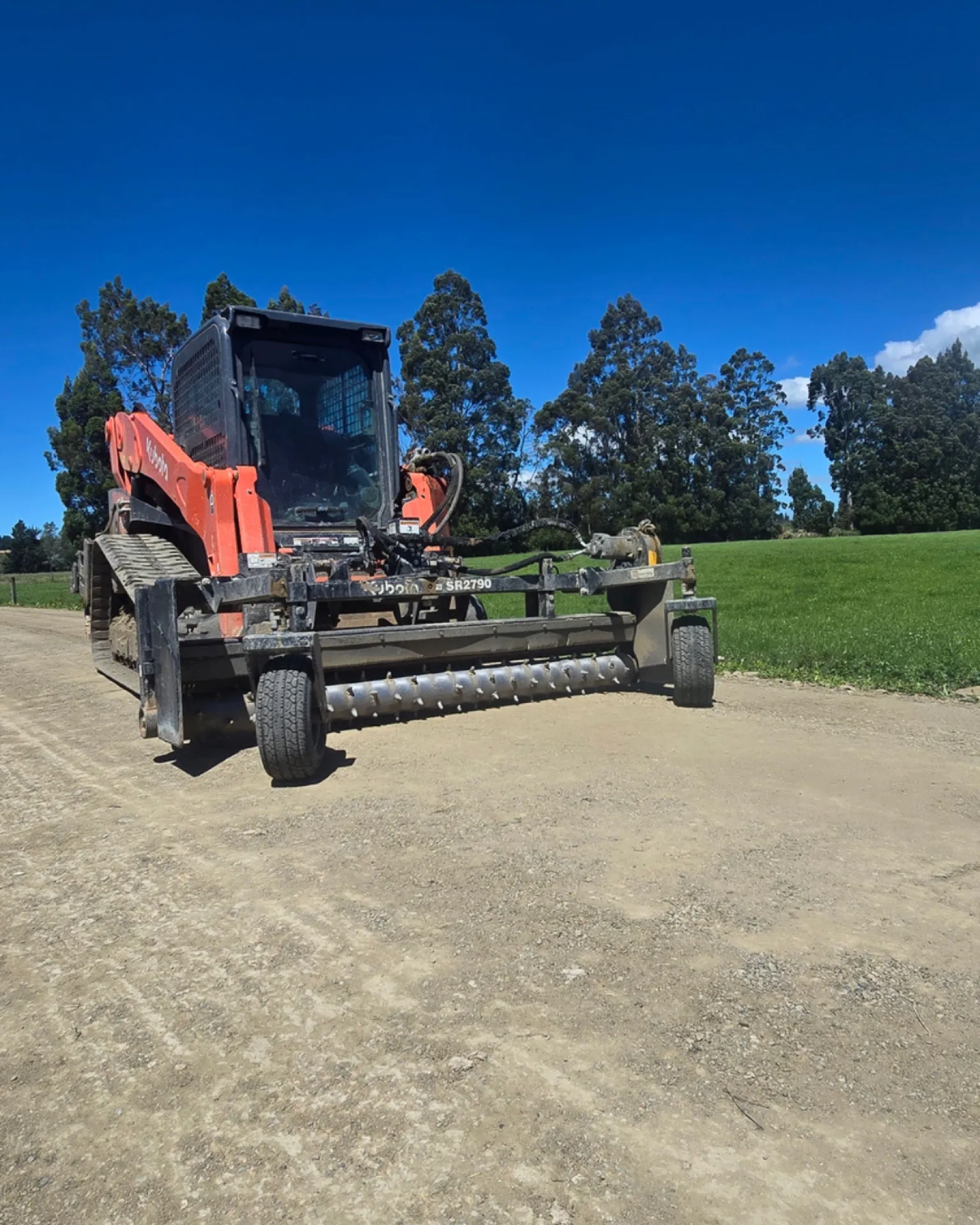 Power rake ready to resurface a rural driveway